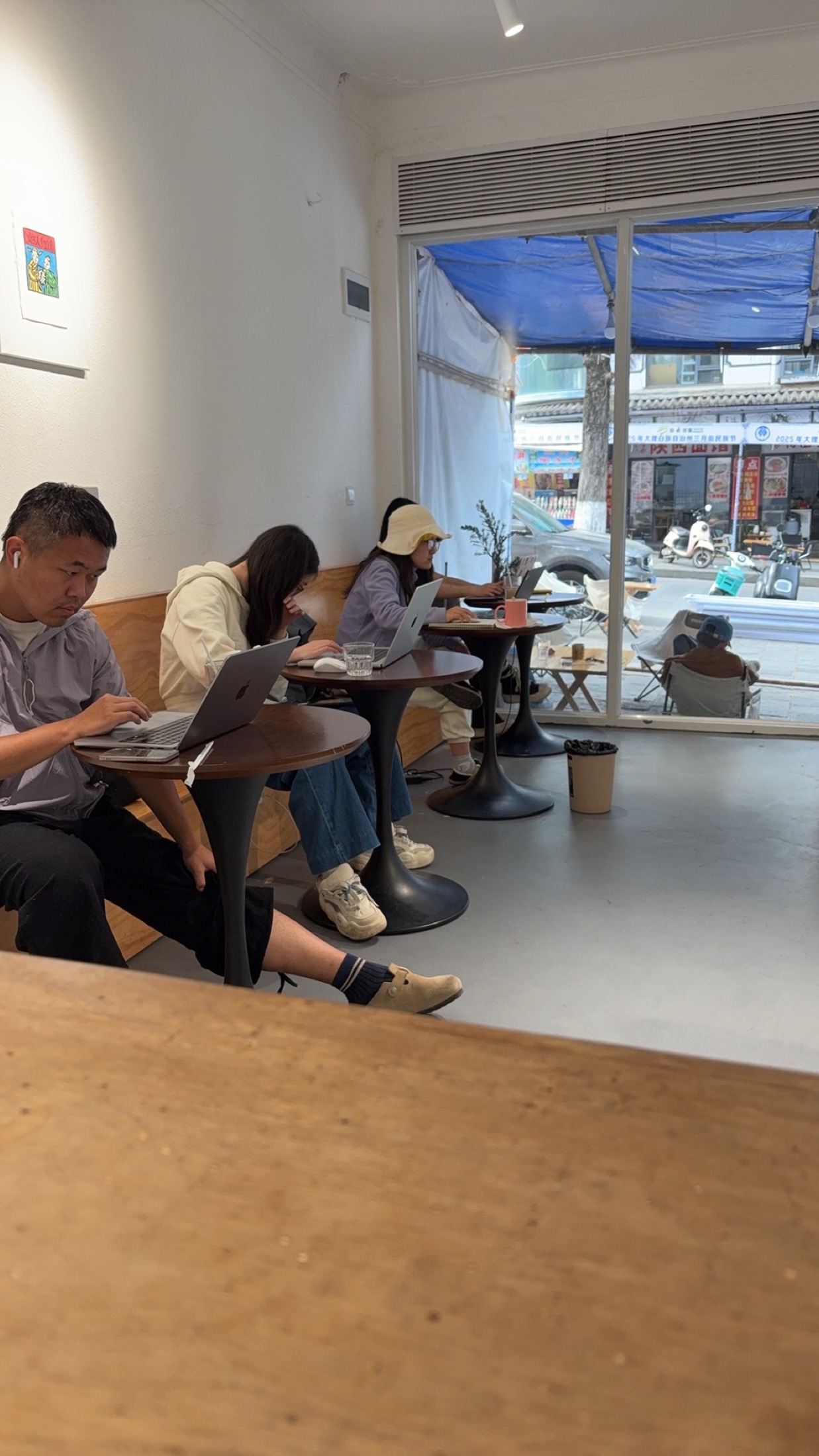 Person working at Mubai Cafe